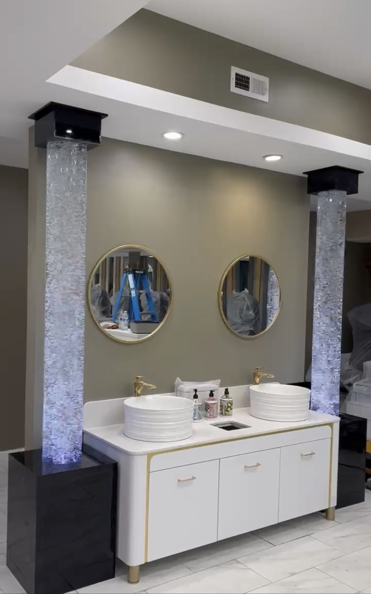 Elegant water wall design with LED lighting in a contemporary living room